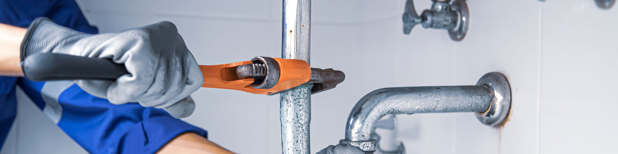 Plumber Fixing Drain